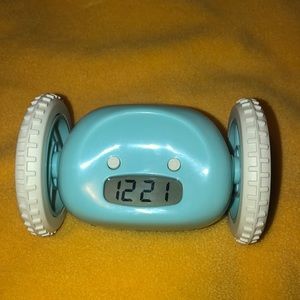 Clocky! the alarm clock that runs away!